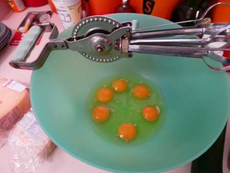 eggs in bowl with whisk
