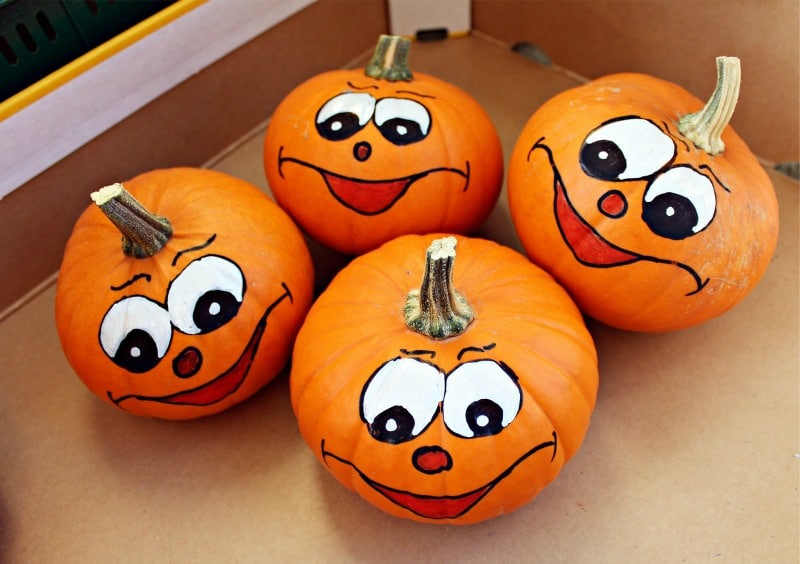 Pumpkin faces (cute faces painted on pumpkins)