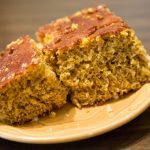 Pieces of pumpkin, banana and spice bread on a plate on table