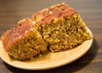 Pieces of pumpkin, banana and spice bread on a plate on table