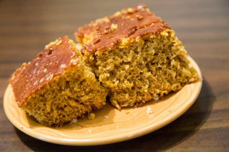 Pieces of pumpkin, banana and spice bread on a plate on table