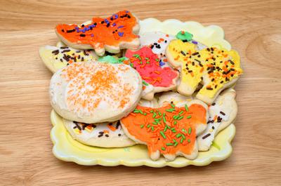 Iced pumpkin sugar cookies decorated by our neighborhood kids